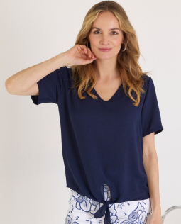 Bluse mit Spitze und Saumknoten