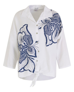 Bluse mit Saumknoten und Blüten